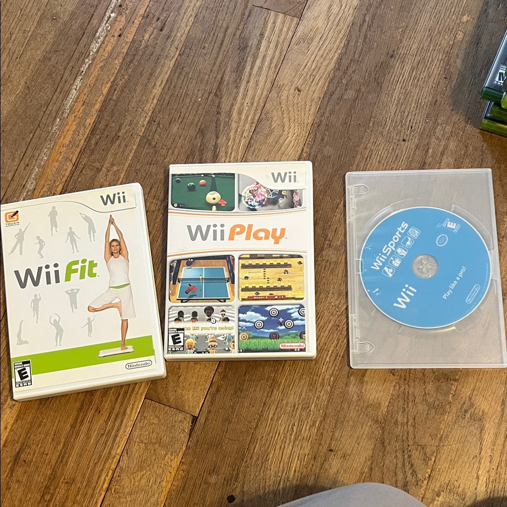 Nintendo Wii Game Set - White Cases with Blue Disc